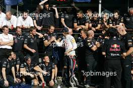 11.09.2011 Monza, Italy, Sebastian Vettel (GER), Red Bull Racing celebrates his win with the team - Formula 1 World Championship, Rd 13, Italian Grand Prix, Sunday Podium