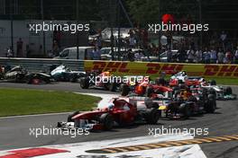 11.09.2011 Monza, Italy, Fernando Alonso (ESP), Scuderia Ferrari leads the start of the race  - Formula 1 World Championship, Rd 13, Italian Grand Prix, Sunday Race