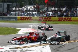 11.09.2011 Monza, Italy, Fernando Alonso (ESP), Scuderia Ferrari and Michael Schumacher (GER), Mercedes GP Petronas F1 Team  - Formula 1 World Championship, Rd 13, Italian Grand Prix, Sunday Race