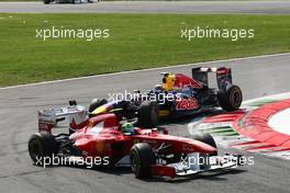 11.09.2011 Monza, Italy, Mark Webber (AUS), Red Bull Racing crashes with Felipe Massa (BRA), Scuderia Ferrari  - Formula 1 World Championship, Rd 13, Italian Grand Prix, Sunday Race