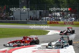 11.09.2011 Monza, Italy, Fernando Alonso (ESP), Scuderia Ferrari and Michael Schumacher (GER), Mercedes GP Petronas F1 Team  - Formula 1 World Championship, Rd 13, Italian Grand Prix, Sunday Race