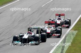 11.09.2011 Monza, Italy,  Michael Schumacher (GER), Mercedes GP Petronas F1 Team, Lewis Hamilton (GBR), McLaren Mercedes, Jenson Button (GBR), McLaren Mercedes - Formula 1 World Championship, Rd 13, Italian Grand Prix, Sunday Race