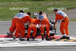 11.09.2011 Monza, Italy,  Rubens Barrichello (BRA), AT&T Williams gets beached on a curb after a crash caused by Vitantonio Liuzzi (ITA), HRT Formula One Team - Formula 1 World Championship, Rd 13, Italian Grand Prix, Sunday Race