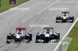 11.09.2011 Monza, Italy,  Michael Schumacher (GER), Mercedes GP Petronas F1 Team, Lewis Hamilton (GBR), McLaren Mercedes, Jenson Button (GBR), McLaren Mercedes - Formula 1 World Championship, Rd 13, Italian Grand Prix, Sunday Race