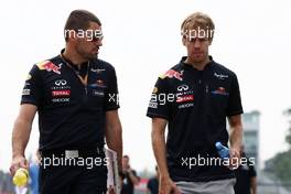 08.09.2011 Monza, Italy,  Guillaume Rocquelin, Red Bull Racing Race Engineer and Sebastian Vettel (GER), Red Bull Racing - Formula 1 World Championship, Rd 13, Italian Grand Prix, Thursday