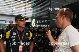 08.09.2011 Monza, Italy,  Heikki Kovalainen (FIN), Team Lotus, Mika Salo (FIN) - Formula 1 World Championship, Rd 13, Italian Grand Prix, Thursday
