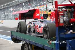 07.10.2011 Suzuka, Japan, Sebastian Vettel (GER), Red Bull Racing car is taken back to the pit lane  - Formula 1 World Championship, Rd 15, Japanese Grand Prix, Friday