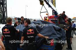 07.10.2011 Suzuka, Japan, Sebastian Vettel (GER), Red Bull Racing car is taken back to the pit lane  - Formula 1 World Championship, Rd 15, Japanese Grand Prix, Friday