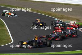 09.10.2011 Suzuka, Japan, Sebastian Vettel (GER), Red Bull Racing leads the start of the race  - Formula 1 World Championship, Rd 15, Japanese Grand Prix, Sunday Race