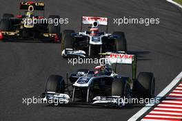 09.10.2011 Suzuka, Japan, Pastor Maldonado (VEN), AT&T Williams leads Rubens Barrichello (BRA), AT&T Williams  - Formula 1 World Championship, Rd 15, Japanese Grand Prix, Sunday Race