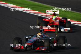09.10.2011 Suzuka, Japan, Lewis Hamilton (GBR), McLaren Mercedes leads Felipe Massa (BRA), Scuderia Ferrari  - Formula 1 World Championship, Rd 15, Japanese Grand Prix, Sunday Race