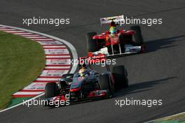 09.10.2011 Suzuka, Japan,  Lewis Hamilton (GBR), McLaren Mercedes and Michael Schumacher (GER), Mercedes GP  - Formula 1 World Championship, Rd 15, Japanese Grand Prix, Sunday Race
