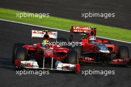09.10.2011 Suzuka, Japan, Felipe Massa (BRA), Scuderia Ferrari leads Jerome d'Ambrosio (BEL), Marussia Virgin Racing  - Formula 1 World Championship, Rd 15, Japanese Grand Prix, Sunday Race