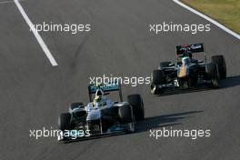 09.10.2011 Suzuka, Japan,  Nico Rosberg (GER), Mercedes GP and Heikki Kovalainen (FIN), Team Lotus  - Formula 1 World Championship, Rd 15, Japanese Grand Prix, Sunday Race