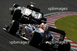 09.10.2011 Suzuka, Japan,  Jenson Button (GBR), McLaren Mercedes and Sebastian Vettel (GER), Red Bull Racing  - Formula 1 World Championship, Rd 15, Japanese Grand Prix, Sunday Race
