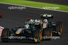 09.10.2011 Suzuka, Japan, Heikki Kovalainen (FIN), Team Lotus leads Jarno Trulli (ITA), Team Lotus  - Formula 1 World Championship, Rd 15, Japanese Grand Prix, Sunday Race