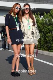 08.10.2011 Suzuka, Japan, Jessica Michibata (JPN) (Right) with her younger sister Angelica Michibata (JPN)  - Formula 1 World Championship, Rd 15, Japanese Grand Prix, Saturday Practice