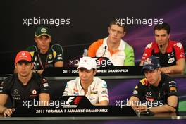 06.10.2011 Suzuka, Japan,  Jenson Button (GBR), McLaren Mercedes, Kamui Kobayashi (JAP), Sauber F1 Team and Sebastian Vettel (GER), Red Bull Racing  - Formula 1 World Championship, Rd 15, Japanese Grand Prix, Thursday Press Conference