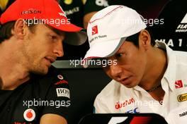 06.10.2011 Suzuka, Japan,  Jenson Button (GBR), McLaren Mercedes and Kamui Kobayashi (JAP), Sauber F1 Team  - Formula 1 World Championship, Rd 15, Japanese Grand Prix, Thursday Press Conference
