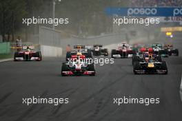 16.10.2011 Yeongam, Korea,  Start of the race, Sebastian Vettel (GER), Red Bull Racing and Lewis Hamilton (GBR), McLaren Mercedes  - Formula 1 World Championship, Rd 16, Korean Grand Prix, Sunday Race