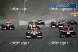 16.10.2011 Yeongam, Korea,  Start of the race, Sebastian Vettel (GER), Red Bull Racing and Lewis Hamilton (GBR), McLaren Mercedes  - Formula 1 World Championship, Rd 16, Korean Grand Prix, Sunday Race