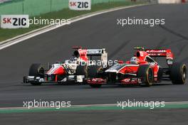 16.10.2011 Yeongam, Korea,  Jerome d'Ambrosio (BEL), Virgin Racing and Daniel Ricciardo (AUS) Hispania Racing Team, HRT  - Formula 1 World Championship, Rd 16, Korean Grand Prix, Sunday Race
