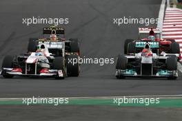 16.10.2011 Yeongam, Korea,  Michael Schumacher (GER), Mercedes GP and Vitaly Petrov (RUS), Lotus Renalut F1 Team  - Formula 1 World Championship, Rd 16, Korean Grand Prix, Sunday Race