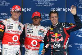 15.10.2011 Yeongam, Korea,  Jenson Button (GBR), McLaren Mercedes, Lewis Hamilton (GBR), McLaren Mercedes and Sebastian Vettel (GER), Red Bull Racing - Formula 1 World Championship, Rd 16, Korean Grand Prix, Saturday Qualifying