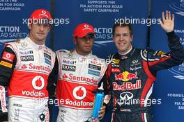 15.10.2011 Yeongam, Korea,  Jenson Button (GBR), McLaren Mercedes, Lewis Hamilton (GBR), McLaren Mercedes and Sebastian Vettel (GER), Red Bull Racing - Formula 1 World Championship, Rd 16, Korean Grand Prix, Saturday Qualifying