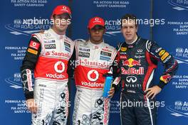 15.10.2011 Yeongam, Korea,  Jenson Button (GBR), McLaren Mercedes, Lewis Hamilton (GBR), McLaren Mercedes and Sebastian Vettel (GER), Red Bull Racing - Formula 1 World Championship, Rd 16, Korean Grand Prix, Saturday Qualifying