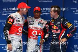 15.10.2011 Yeongam, Korea, Jenson Button (GBR), McLaren Mercedes with Lewis Hamilton (GBR), McLaren Mercedes and Sebastian Vettel (GER), Red Bull Racing  - Formula 1 World Championship, Rd 16, Korean Grand Prix, Saturday Qualifying