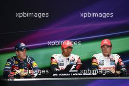 15.10.2011 Yeongam, Korea, Sebastian Vettel (GER), Red Bull Racing with Lewis Hamilton (GBR), McLaren Mercedes and Jenson Button (GBR), McLaren Mercedes  - Formula 1 World Championship, Rd 16, Korean Grand Prix, Saturday Press Conference