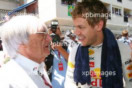 29.05.2011 Monte Carlo, Monaco,  Bernie Ecclestone (GBR) and Sebastian Vettel (GER), Red Bull Racing  - Formula 1 World Championship, Rd 06, Monaco Grand Prix, Sunday Pre-Race Grid