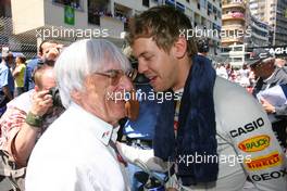 29.05.2011 Monte Carlo, Monaco,  Bernie Ecclestone (GBR) and Sebastian Vettel (GER), Red Bull Racing  - Formula 1 World Championship, Rd 06, Monaco Grand Prix, Sunday Pre-Race Grid