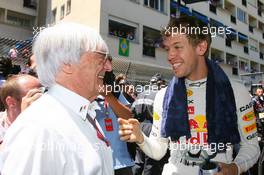 29.05.2011 Monte Carlo, Monaco,  Bernie Ecclestone (GBR) with Sebastian Vettel (GER), Red Bull Racing - Formula 1 World Championship, Rd 06, Monaco Grand Prix, Sunday Pre-Race Grid
