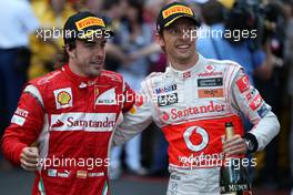 29.05.2011 Monte Carlo, Monaco,  Fernando Alonso (ESP), Scuderia Ferrari, Jenson Button (GBR), McLaren Mercedes - Formula 1 World Championship, Rd 06, Monaco Grand Prix, Sunday Podium