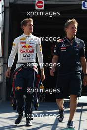 26.05.2011 Monte Carlo, Monaco,  Sebastian Vettel (GER), Red Bull Racing with his trainer Tommi - Formula 1 World Championship, Rd 06, Monaco Grand Prix, Thursday