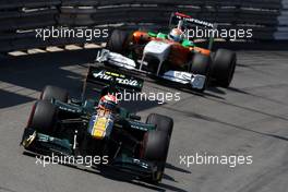 26.05.2011 Monte Carlo, Monaco,  Jarno Trulli (ITA), Team Lotus leads Adrian Sutil (GER), Force India F1 Team, VJM-04 - Formula 1 World Championship, Rd 06, Monaco Grand Prix, Thursday Practice