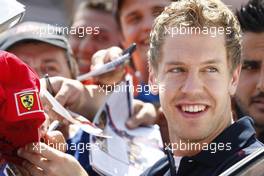 25.05.2011 Monaco, Monte Carlo, Sebastian Vettel (GER), Red Bull Racing signing autographs for the fans - Formula 1 World Championship, Rd 6, Monaco Grand Prix, Wednesday