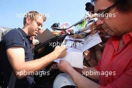 25.05.2011 Monaco, Monte Carlo, Sebastian Vettel (GER), Red Bull Racing signing autographs for the fans - Formula 1 World Championship, Rd 6, Monaco Grand Prix, Wednesday