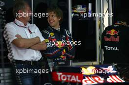 08.04.2011 Sepang, Malaysia,  Sebastian Vettel (GER), Red Bull Racing and Helmut Marko (AUT), Red Bull Racing, Red Bull Advisor - Formula 1 World Championship, Rd 02, Malaysian Grand Prix, Friday Practice