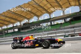 08.04.2011 Sepang, Malaysia,  Sebastian Vettel (GER), Red Bull Racing - Formula 1 World Championship, Rd 02, Malaysian Grand Prix, Friday Practice