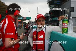 10.04.2011 Sepang, Malaysia,  Felipe Massa (BRA), Scuderia Ferrari - Formula 1 World Championship, Rd 02, Malaysian Grand Prix, Sunday Pre-Race Grid