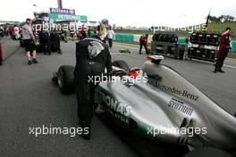 10.04.2011 Sepang, Malaysia,  Michael Schumacher (GER), Mercedes GP  - Formula 1 World Championship, Rd 02, Malaysian Grand Prix, Sunday Pre-Race Grid