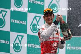 10.04.2011 Sepang, Malaysia,  Jenson Button (GBR), McLaren Mercedes  - Formula 1 World Championship, Rd 02, Malaysian Grand Prix, Sunday Podium