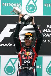 10.04.2011 Sepang, Malaysia,  Sebastian Vettel (GER), Red Bull Racing  - Formula 1 World Championship, Rd 02, Malaysian Grand Prix, Sunday Podium