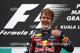 10.04.2011 Sepang, Malaysia,  Sebastian Vettel (GER), Red Bull Racing  - Formula 1 World Championship, Rd 02, Malaysian Grand Prix, Sunday Podium