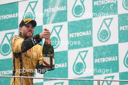 10.04.2011 Sepang, Malaysia,  3rd place Nick Heidfeld (GER), Lotus Renault GP - Formula 1 World Championship, Rd 02, Malaysian Grand Prix, Sunday Podium