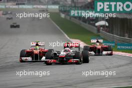 10.04.2011 Sepang, Malaysia,  Jenson Button (GBR), McLaren Mercedes and Felipe Massa (BRA), Scuderia Ferrari  - Formula 1 World Championship, Rd 02, Malaysian Grand Prix, Sunday Race