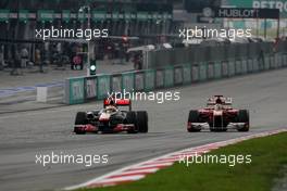 10.04.2011 Sepang, Malaysia,  Lewis Hamilton (GBR), McLaren Mercedes and Fernando Alonso (ESP), Scuderia Ferrari  - Formula 1 World Championship, Rd 02, Malaysian Grand Prix, Sunday Race